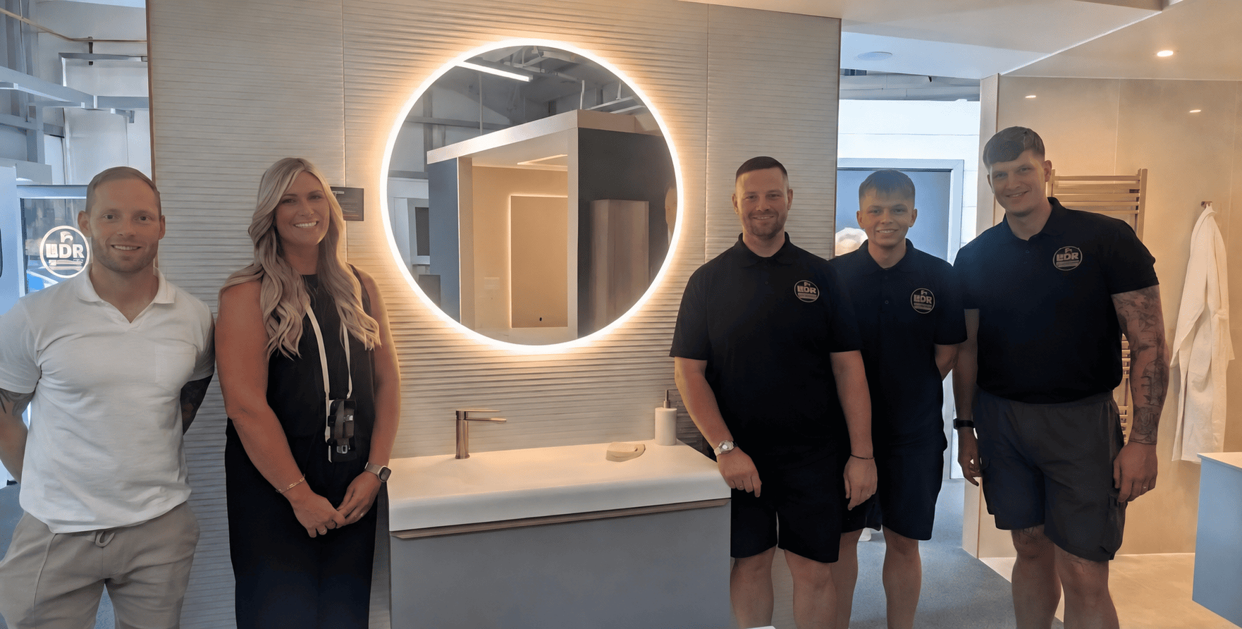 Bud, Danielle, and the BDR Bathroom Innovation team at their Kirkcaldy showroom